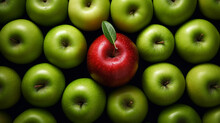 Amidst Green Apples, The Red One Exemplifies The Business Concept Of Standing Out For Selection, Symbolizing Uniqueness And Desirability