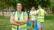 © Krakenimages.com - Group of people volunteers smiling confident standing with arms crossed gesture at park