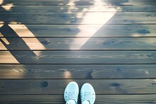 Selfie Shot Of Feet Woman Standing On Wooden Floor With Shadow Of Bokeh From Sunlight