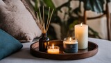 Aroma diffuser and candle tray in relaxing oasis, focused atmosphere