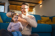 © Miljan Živković - Adult caucasian man father play with daughter two years old girl