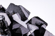 Magnetite (natural magnet, iron ore) detail close-up semi-precious gemstone macro 
