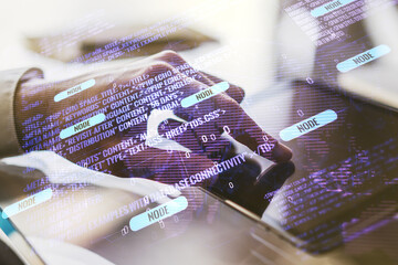 Multi exposure of abstract software development hologram with world map and finger presses on a digital tablet on background, global research and analytics concept
