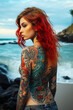 Beautiful woman with exposed back tattoos standing by the sea