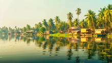Kerala Tourism A Hazy And Beautiful River Scene With Thatched Houseboats And Palm Trees AI Generated
