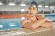 © Ilzer/peopleimages.com - Sports, thinking or woman in swimming pool training for competition, wellness or fitness workout. Healthy, face or tired female athlete swimmer in the water for exercise or resting on break to relax