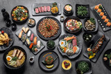 Fototapeta Uliczki - many traditional japanese food dishes variety on grey background