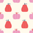 Red and pink pumpkins seamless pattern. 