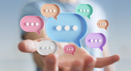 Wall Mural - Businessman using digital speech bubbles talk icons. Minimal conversation or social media messages floating over user hand. 3D rendering