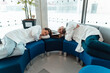 © Westend61 - Doctors sleeping on sofa in hospital