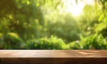 Empty Wooden Table Top, Positioned In Front Of A Blurred Background Of A Lush Green Garden Bathed In Soft Sunlight