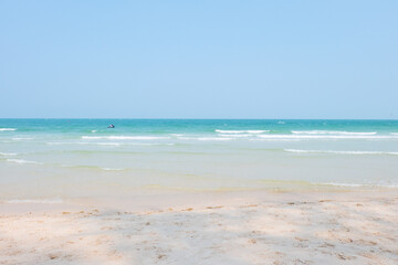 Beautiful tropical beach with white sand and blue sky.