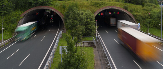 Wall Mural - Trucks in the highway tunnel