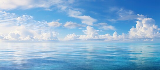 tropical beach panorama, seascape with a wide horizon, showcasing the beautiful expanse of the sky m