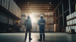 © Taras - Two workers are standing in warehouse. Hangar with racks and boxes with cargo. Loading and unloading of containers, created with Generative AI Technology