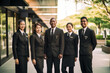 Advertising portrait shot of a hotel staff team together in front of the entrance of the luxury hotel . Generative Ai