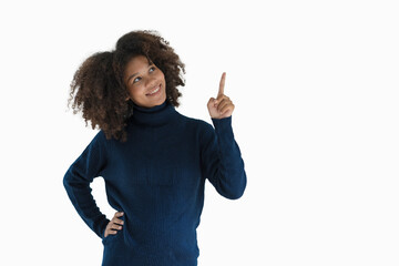 Joyful young professional having a new idea, pointing index finger up. African American businesswoman standing isolated over white background.