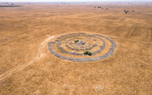 Aerial View Of Ancient Megalithic Monument Site In The Shape Of 3 Concentric Stone Circles, Rujum Al-Hiri, Golan Heights, Israel.