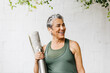 © (JLco) Julia Amaral - Taking an active approach to aging, happy senior woman engaging in a fitness routine outdoors
