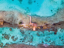 Aerial View Of A Small Fishing Dock Off The Coast Of Aruba.