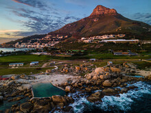 Aerial View Of Maidens Cove Tidal Pool At Sunset With Lions Head Mountain In Background, Cape Town, South Africa.