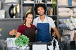 © Vergani Fotografia - Brazilian couple smiles for portrait in a neighborhood shop.