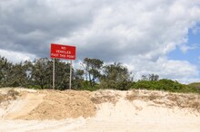 Isolated Road Sign At The Noosa North Shore, Australia, Saying "No Vehicles Past This Point"