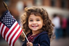 Smiling Girl Waving An American Flag In A Parade