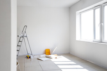 Poster - Wallpaper rolls with supplies and ladder in light room