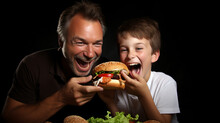 Heartwarming Moment Of Father And Son Eating Hamburgers Together