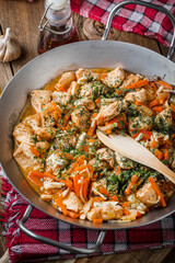 Canvas Print - Fried chicken pieces with vegetables.