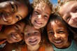 © Banana Images - Group of diverse cheerful fun happy multiethnic children outdoors