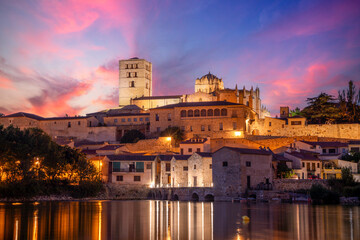 Sticker - View at dusk of the old town of Zamora, Castilla y Len, Spain, with the cathedral on top and the Tormes river in the foreground