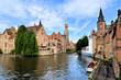 View of the medieval canals of Bruges, Belgium with famous bell tower