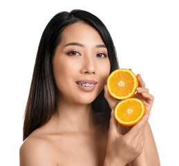 Sticker - Beautiful young Asian woman with orange on white background