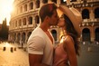 A couple kissing in front of the Colosseum. Rome, Italy