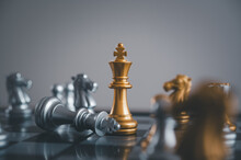 Stand Of Golden King Chess And Fallen Silver King Chess.chess Board Game Concept Of Business Ideas And Competition And Stratagy Plan Success Meaning