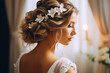 © MVProductions - Hairdresser making an elegant hairstyle styling bride with white flowers in her hair