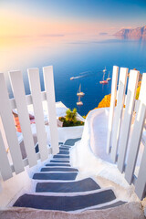 Wall Mural - Open Gate to Paradise. Santorini, Greece. White architecture, open doors and steps to the blue sea of Santorini, Oia