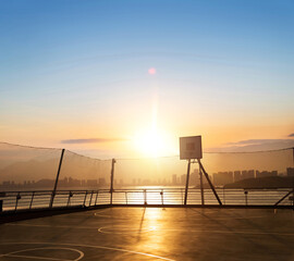 Wall Mural - Outside basketball court on the roof with net around