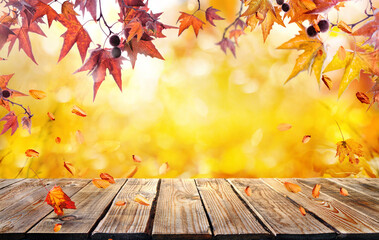 Wall Mural - orange fall  leaves and old wooden board, autumn natural background