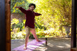 © Wavebreak Media - Focused indian man practicing yoga on sunny terrace, copy space