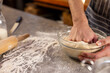 © Wavebreak Media - Hands of indian man in apron preparing bread dough in sunny kitchen at home, copy space