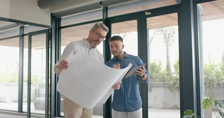 Wall Mural - two diverse mele architects with digital tablet and a plan discussing at office