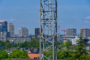 Wall Mural - apartment tower, architecture, blue, bright, building, buildings, business, city, cityscape, construction site, crane, district, gray, green, grey, industry, landmark, modern, north, office tower, out