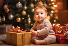 Cute Baby Sitting Under Christmas Tree And Guardian Gifts