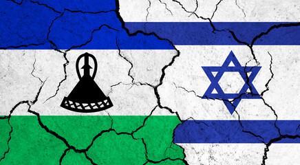 Flags of Lesotho and Israel on cracked surface - politics, relationship concept