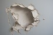 patching a hole in drywall with putty knife