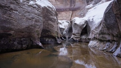 Sticker - Big cave with water ponds and huge rocks covered in minerals and salt