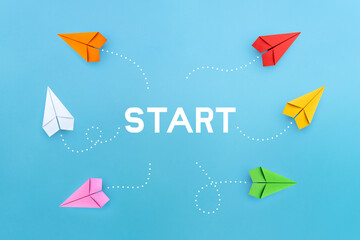 Wall Mural - Paper planes on blue background. Startup, Innovative concepts.